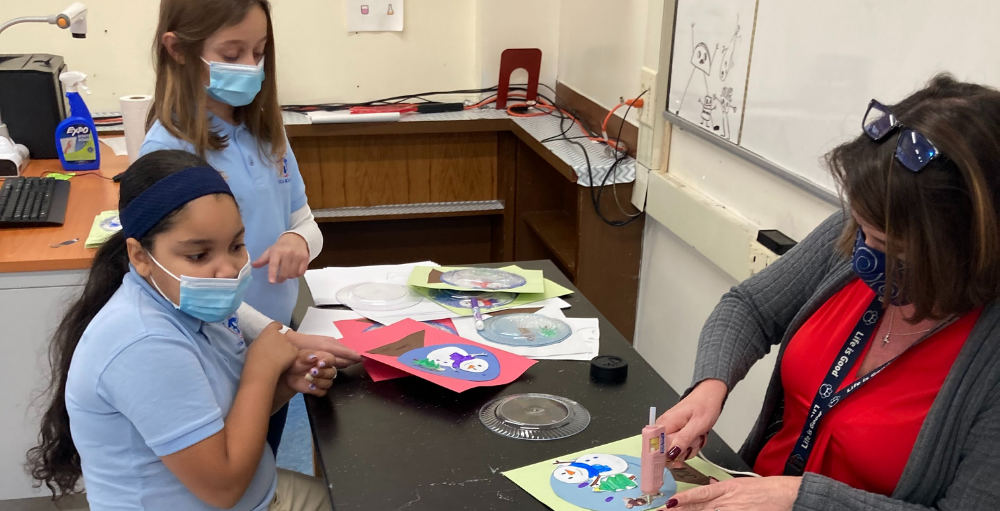 Utica Academy of Science elementary school students design their very own paper snow globes for a fun and creative winter arts and crafts class project.