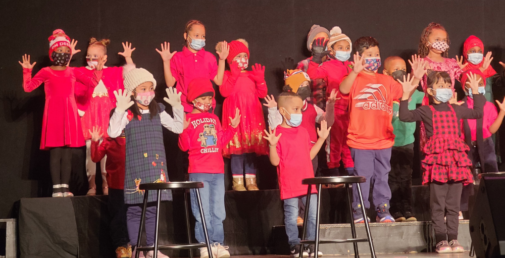 Utica Academy of Science elementary school Atoms sang and danced to a variety of holiday songs at their annual Holiday Concert held at the Stanley Theater.